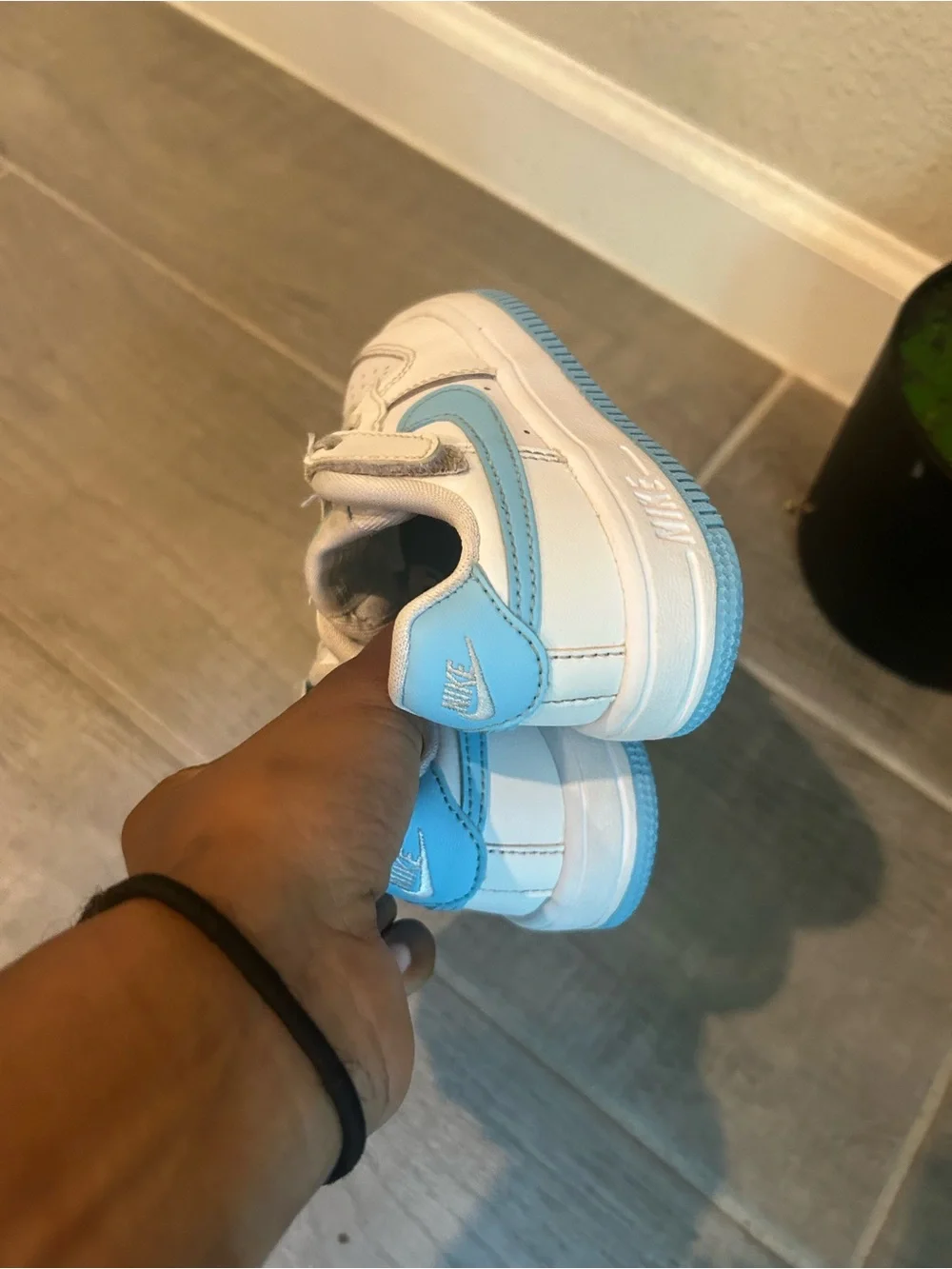 Nike Kids White Sneakers with Light Blue Accents